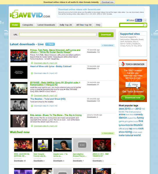 savevid.com download online video and audio - initial screen full of ads and community stuff
